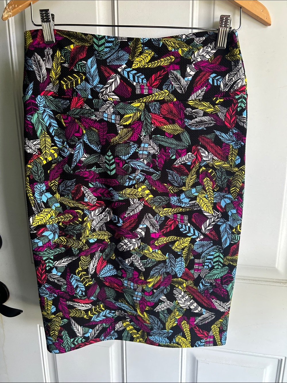 LuLaRoe Black Pencil Skirt with Yellow, Pink, Blue & White Feather Print